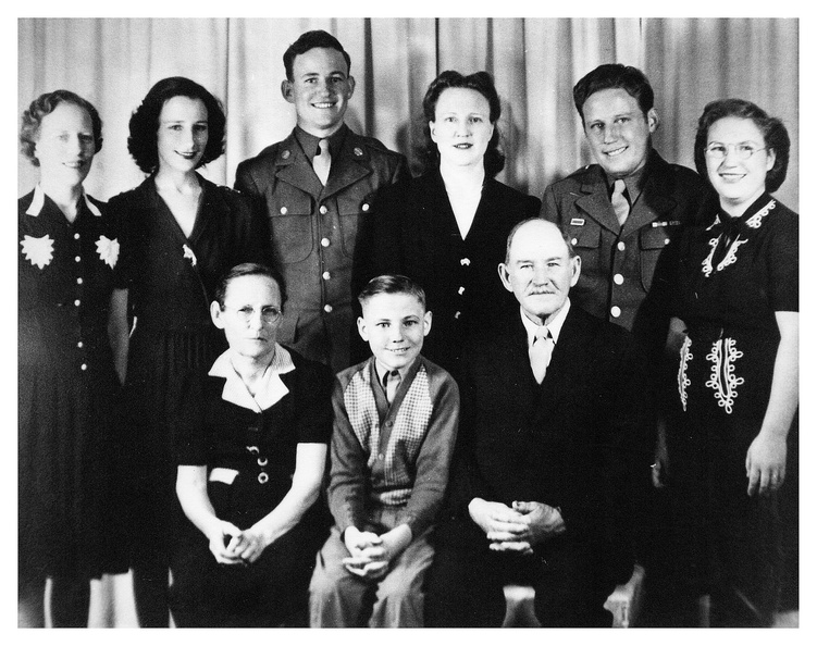 McPherson Family - Back row: Laura Novella, Minnie Ada, Joel Watson, Elva Edith, John Carson, Mary Eliza, Front row: Floy Edith McPherson Talley, Oliver Earl, Joel Walter McPherson
Genealogy Link: Ada McPherson Muxó 00138.jpg