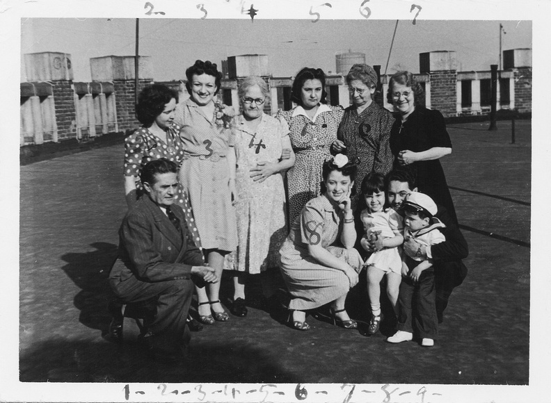 1-Humberto Santoni 2-Esther Muxó 3-Ines Quiñones (Ralph's sweetheart) 4-Lolita (Hiram's mother) 5-Bertila Nieto Muxó (Hector's wife) 6-Elena Muxó Santoni 7-Elena Quiñones Ramirez 8-Bertha Quiñones (Helen Ramirez's daughter) 9-Bertha Quiñones husband and children. p000031.jpg