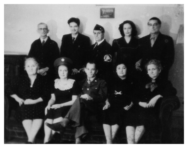 Back row L to R: Francisco Muxó, unknown, unknown, unknown, unknown. Front row: Dolores Ríos Muxó, Esther Muxó Coll, Hector Muxó, Bertila Nieto Muxó, unknown p000211.jpg